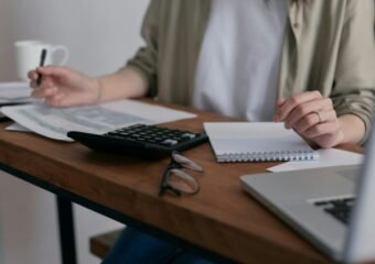 australian woman doing taxes at desk