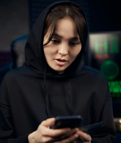 woman looking at smartphone security warning