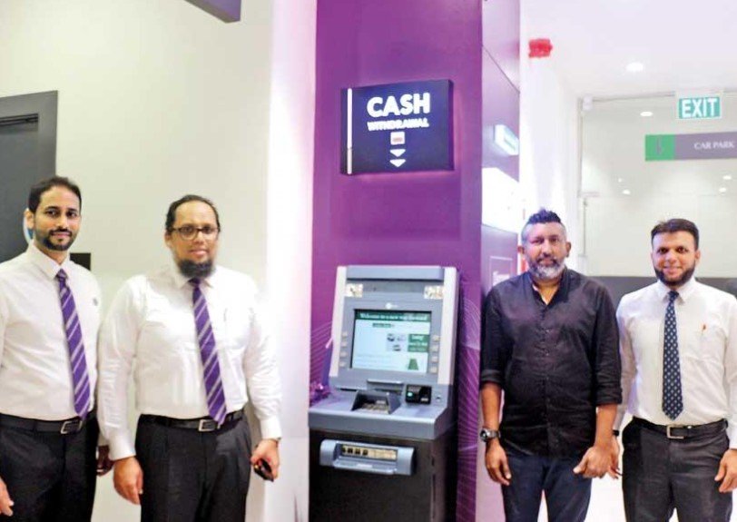 Sri Lanka bank customer queue outside ATM