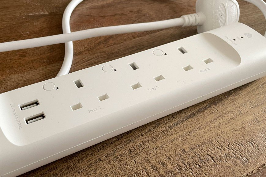 kasa smart plug on wooden table
