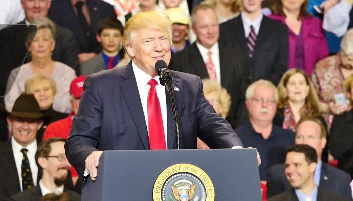 Donald Trump speaking at podium