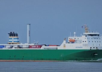 modern cargo ship with rotors