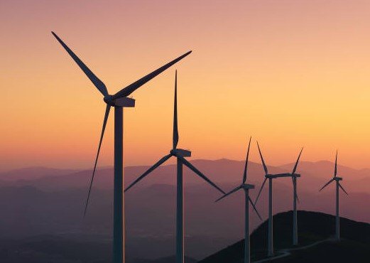 wind farm at sunset