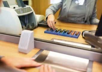 Vietnam bank teller counting