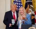 kaillie humphries presents ikkos medal to trump