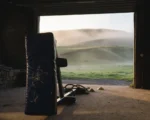 GSI Performance contact training sled inside a Galashiels workshop with Scottish Borders hills behind.