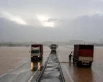 Accra floods strand tomato trucks on Pokuase road Monday